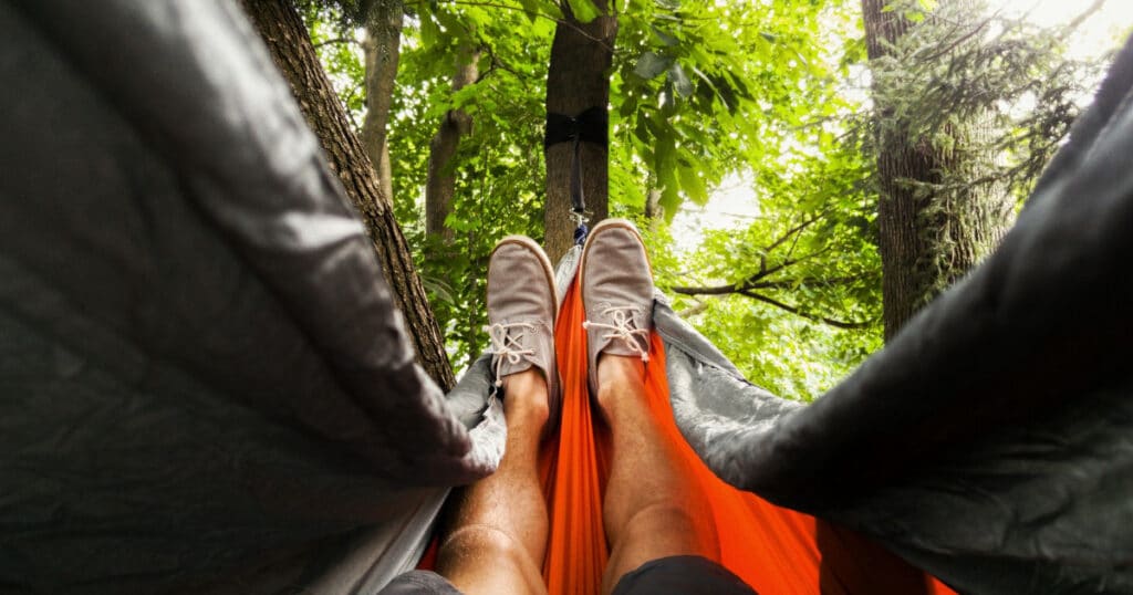 relax in a hammock surrounded by nature