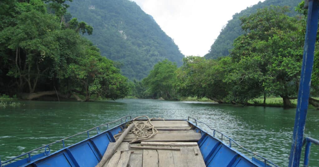 Boat ride on Ba Be Lake - a top trekking destination in Northern Vietnam