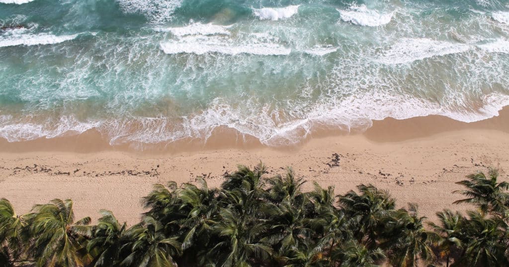 birdseye view of the tropical beaches of Costa Rica where sustainable tourism is key