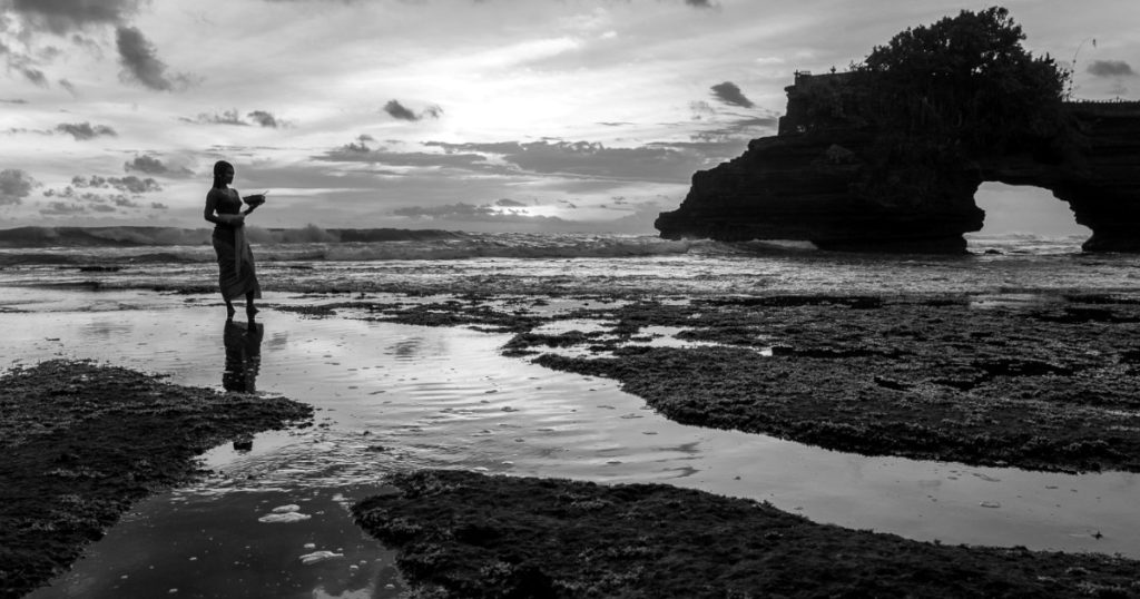 Indonesian women standing on the beach - uncovering Indonesia's cultural riches