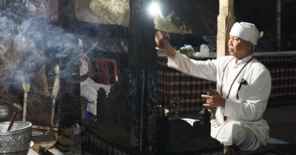 Religious traditions in a cave temple in Indonesia