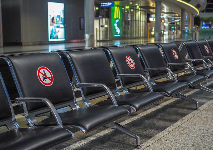Socially distanced chairs in airport