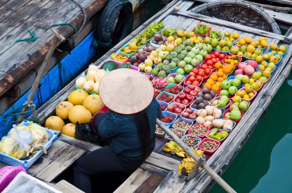 Vietnam fruit seller on a boat