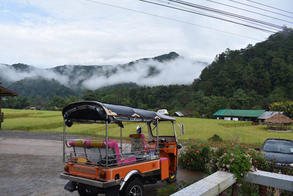 Tuk Tuk in front of mountain