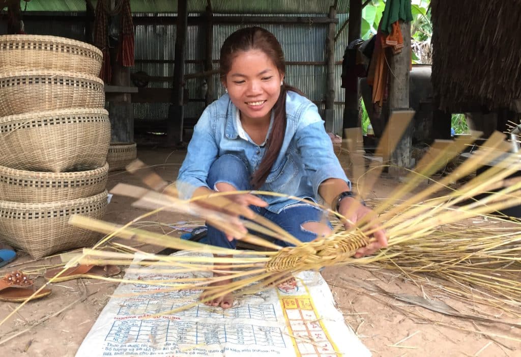 Women travel basket weaving