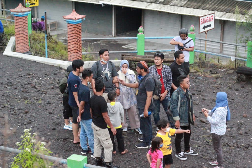 Dimas with tour group