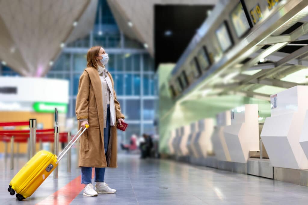 woman wearing mask in airport