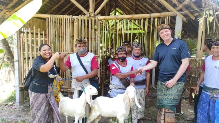 Ayu and Peter Christiansen with goats of Manggis