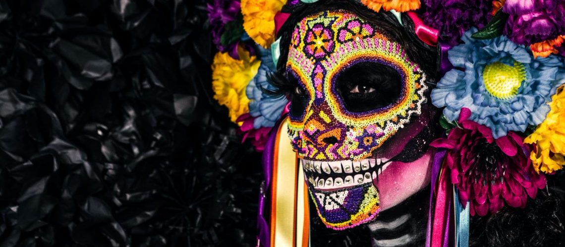 Colourful day of the dead skull face paint